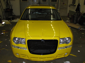 Chrysler 300C fényes sárga karosszéria fóliázás